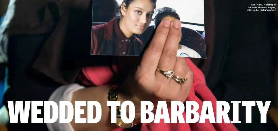  ??  ?? LOST GIRL: A sibling of Isil bride Shamima Begum, holds up her sister’s picture