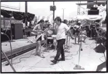  ?? COURTESY OF BILL FIBBEN ?? Bruce Hampton (foreground) and the Hampton Grease Band performed at the Atlanta Pop Festival in 1970 in Byron, Georgia. The band included Glenn Phillips (guitar), Jerry Fields (drums), Mike Holbrook (bass) and Harold Kelling (guitar).