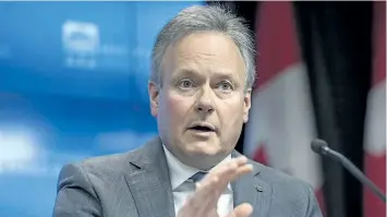  ?? JUSTIN TANG/THE CANADIAN PRESS ?? Governor of the Bank of Canada Stephen Poloz speaks to reporters during a press conference following the release of the Financial Systems Review in Ottawa on Tuesday