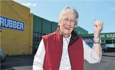  ?? PHOTO: GREGOR RICHARDSON ?? Check it out . . . Longtime South Dunedin library campaigner Anne Turvey is excited the Dunedin City Council has finally bought a site for a permanent library and community complex.