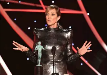  ?? AP PHOTO ?? Allison Janney accepts the award for outstandin­g performanc­e by a female actor in a supporting role for “I, Tonya” at the 24th annual Screen Actors Guild Awards at the Shrine Auditorium & Expo Hall on Sunday in Los Angeles.