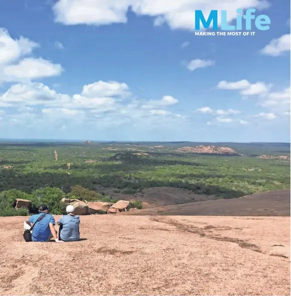  ??  ?? The view of the Texas Hill Country from atop Enchanted Rock goes on for miles. More than 250,000 people visit the state natural area annually. STEVE AHILLEN/SPECIAL TO THE NEWS SENTINEL