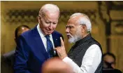  ?? BAY ISMOYO / POOL PHOTO VIA AP ?? U.S. President Joe Biden talks with India’s Prime Minister Narendra Modi during the G20 Summit in Nusa Dua, Bali, Indonesia, on Tuesday.