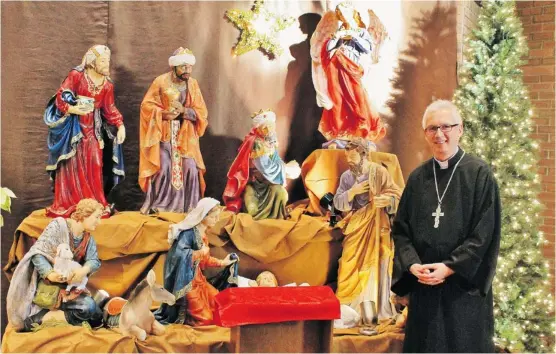  ?? Anna Toneguzzi/calgary Herald ?? Father Mark Bayrock says, “It’s popularly called Ukrainian Christmas by people, but it belongs to more cultures than just the Ukrainians.”