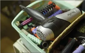  ??  ?? Some of Raelyn Mert’s hair styling tools.
