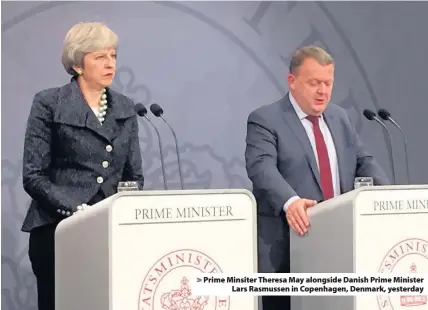  ??  ?? > Prime Minsiter Theresa May alongside Danish Prime Minister Lars Rasmussen in Copenhagen, Denmark, yesterday