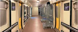  ??  ?? The modified interiors of the former Class 319 units are now repurposed to accommodat­e parcel traffic, with roll cages and other fittings to accommodat­e pallet loads, as well as parcels. Network Rail