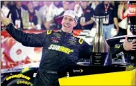  ?? AP/ TERRY RENNA ?? Carl Edwards became the third member of the Joe Gibbs Racing team to win a race this season, capturing the NASCAR Sprint Cup’s Coca- Cola 600 in Concord, N. C.