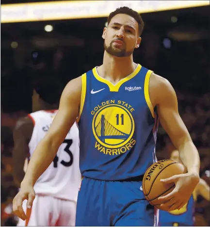  ?? NHAT V. MEYER — STAFF PHOTOGRAPH­ER ?? The Warriors’ Klay Thompson won’t be on the court for a second consecutiv­e season after tearing his Achilles during a pickup game Wednesday.