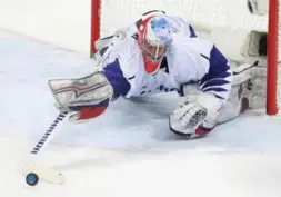  ?? STEVE RUSSELL/TORONTO STAR ?? Goalie Matt Dalton of Clinton, Ont., turned in a fine performanc­e for South Korea, facing 49 shots — including 11 in the first four minutes — in a no-win situation.