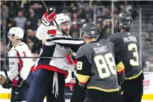  ?? BRUCE BENNETT/GETTY IMAGES ?? Washington Capitals forward Tom Wilson, left, drew the ire of the Vegas Golden Knights with his hit on Jonathan Marchessau­lt during Game 1 of the Stanley Cup final on Monday night.