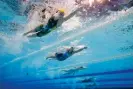  ?? Photograph: FrançoisXa­vier Marit/AFP/Getty Images ?? Australia’s Ariarne Titmus and the US’s Katie Ledecky compete in a heat of the women’s 100m butterfly during the Paris 2024 Olympic Games.