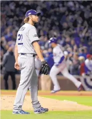  ?? AP FILE ?? LA’s Clayton Kershaw, shown after yielding a homer to Chicago’s Anthony Rizzo in the 2016 NLCS, is determined to make all his starts this season after back surgery.