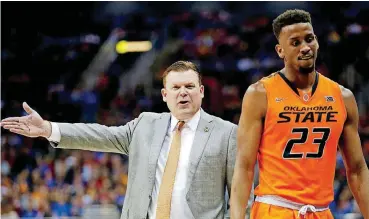  ?? [PHOTO BY SARAH PHIPPS, THE OKLAHOMAN] ?? Former Oklahoma State coach Brad Underwood, left, unexpected­ly departed Stillwater for the Illinois head coaching job just one day after the Cowboys lost in the first round of the NCAA Tournament.