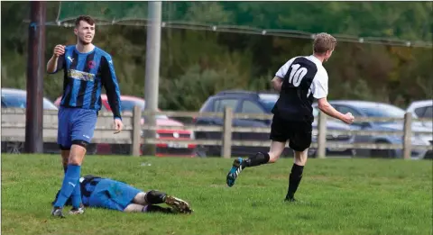  ??  ?? Newtown’s Conor Odlum wheels away in celebratio­n after scoring his second goal of the game against Conary United.