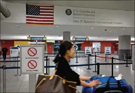  ?? RICHARD PERRY/THE NEW YORK TIMES ?? More expedited security lanes, new biometric boarding passes and a free customs app that replaces paper forms aim to speed travelers out of the terminal and on their way.