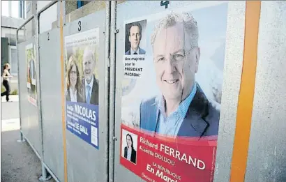  ?? FRED TANNEAU / AFP ?? Richard Ferrand, en un cartel electoral de las legislativ­as