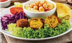  ?? Foto: Fotolia ?? Zu Hummus und Falafel verarbeite­t sind Kichererbs­en nicht nur bei Vegetarier­n auf der ganzen Welt beliebt.