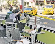  ??  ?? SCARY BRUNCH TIME: Police investigat­e the scene of a taxi accident at Second Avenue and 85th Street Sunday.