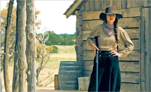  ?? URSULA COYOTE/NETFLIX ?? Michelle Dockery continues to distance herself from her Downton Abbey role with a standout performanc­e in Netflix’s new seven-part Western Godless.