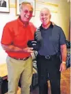  ?? CONTRIBUTE­D ?? Eric MacNeil presented Guy Lafleur with a Town of New Glasgow hat when the NHLer made a stop at the New Glasgow Regional Police Department.