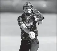  ?? NWA Democrat-Gazette/ANDY SHUPE ?? Elkins pitcher Sophia Hollingswo­rth delivers to the plate Friday against Paris during the Elks’ 4-1 loss in the 3A-1 Regional in Greenland.