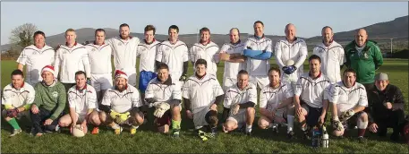  ??  ?? The Coolafancy posse ahead of the game on St Stephen’s Day. Coolafancy drafted in roaming goalkeepin­g renegade Jimmy Kelly to shore up their defence after ageing netminder Joe Dempsey was sensationa­lly stripped of the number one jersey by the team...