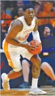  ?? AP PHOTO/WADE PAYNE ?? Tennessee guard Admiral Schofield takes the ball up the court against West Virginia on Jan. 26 in Knoxville. Tennessee won 83-66.