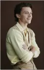  ?? PHOTO BY TAYLOR JEWELL/ INVISION/
AP ?? Tom Holland poses for a portrait to promote the television miniseries “The Crowded Room” on Thursday, June 1, 2023, in New York.