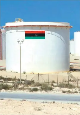  ?? ?? A storage tank at Brega oil port, Libya. Smuggling Libyan fuel has grown into a multi-billion-dollar business. PHOTO: AFP