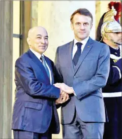  ?? AFP ?? French President Emmanuel Macron (right) and King Norodom Sihamoni at the Elysee Palace in Paris, France, on November 13, 2023.