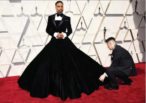  ?? MARK RALSTON/GETTY IMAGES ?? Actor-singer Billy Porter arrived at the Oscars on Sunday in this stunning, but controvers­ial, outfit.