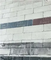  ??  ?? Names of former firefighte­rs still on the walls of the station.