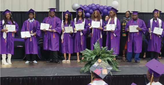  ?? ?? These nine students received Pioneer Awards from Friendship-Southeast for attending the campus from the time it was known as Southeast Arkansas Preparator­y School to graduation: from left, Jasmine Davis, Marcus Antwine, BreShun Goodloe, Arereunti Goodwin, LaParis Harris, Bre’Naria Kearney, Latavia White, Braylon Williams and Kenneth Moore.