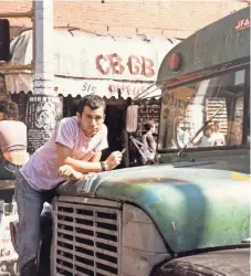  ?? PLACEBO RECORDS ?? Tony "Victor" Beram leaning on the schoolbus JFA toured in outside legendary New York City punk club CBGB on 1984 tour.