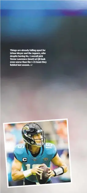  ?? AP ?? Things are already falling apart for Urban Meyer and the Jaguars, who despite having No. 1 overall pick Trevor Lawrence (inset) at QB look even worse than the 1-15 team they fielded last season.