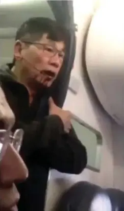  ?? YOUTUBE ?? The recent passenger video that shows three security officials removing a bloodied passenger from a United Airlines flight in at Chicago has caused an uproar.