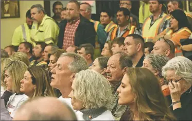  ?? NWA Democrat-Gazette/FLIP PUTTHOFF ?? A standing room-only crowd hears comments Wednesday night at the Benton County Planning Board meeting regarding a proposed limestone mine near Lowell.