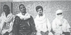  ?? WH MOUSTAPHA ?? Mdou Moctar, second from left, and his band.