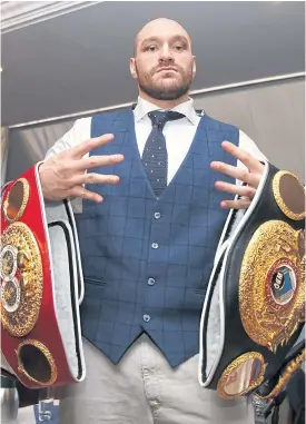  ??  ?? WBA, IBF, WBO and IBO heavyweigh­t champion Tyson Fury.