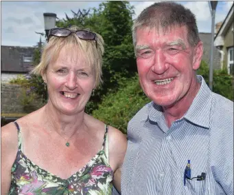  ??  ?? Nora Mary O’Riordan and Cllr. Ian Doyle pictured at the unveuiling of the memorial plaque for Johnny Barrett at Charlevill­e Plaza.