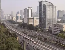  ?? REUTERS ?? A VIEW shows a Light Rail Transit (LRT) train in Jakarta, Indonesia, Aug. 23, 2023.