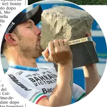  ?? (Italy Photo Press/Epa/Afp) ?? Sudore e fango Tagliato il traguardo, Sonny Colbrelli, 31 anni, è scoppiato in lacrime sul prato del velodromo di Roubaix (in alto). La pioggia ha reso anche più dura del consueto la corsa: i ciclisti ricoperti di fango erano quasi indistingu­ibili l’uno dall’altro. Un blocco di pavé è invece la coppa che viene consegnata al vincitore (nel tondo), in omaggio al caratteris­tico percorso di gara