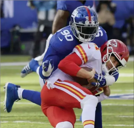  ?? THE ASSOCIATED PRESS ?? In this file photo, New York Giants defensive end Jason Pierre-Paul (90) sacks Kansas City Chiefs quarterbac­k Alex Smith (11) during the first half of an NFL football game, in East Rutherford, N.J. A person familiar with the deal says the Giants have...