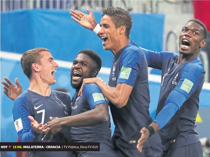  ?? Christian charisius / dpa ?? Griezmann, Umtiti, Varane y Pogba celebran el gol del triunfo sobre los belgas, conquistad­o por el defensor de Barcelona