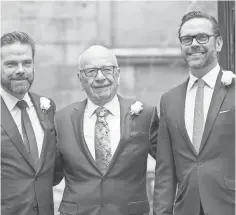  ?? JOHN PHILLIPS, GETTY IMAGES ?? Rupert Murdoch, center, and sons Lachlan, left, and James are no longer protecting executives or anchors accused of bias.