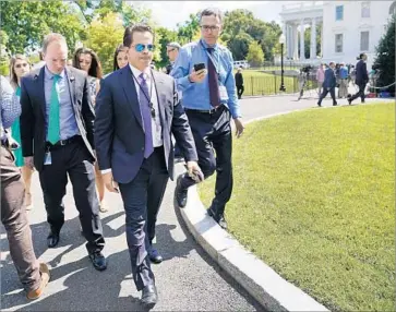  ?? Pablo Martinez Monsivais Associated Press ?? ANTHONY SCARAMUCCI with reporters last week. In a statement, the White House said Scaramucci “felt it was best to give Chief of Staff John Kelly a clean slate and the ability to build his own team.”