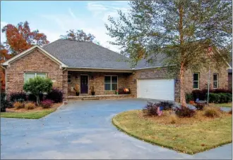  ?? LINDA GARNER-BUNCH/Arkansas Democrat-Gazette ?? This home, located at 6717 Gap Point Circle in Sherwood, has about 4,191 square feet and is listed for $435,495 with Lizzi Futch of Michele Phillips and Company Realtors. Today’s open house is from 2 to 4 p.m. For more informatio­n, call Futch at...