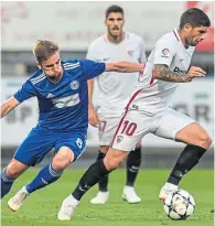  ??  ?? David Houska (left) in action for Sigma Olomouc against Sevilla in the Europa League in 2017