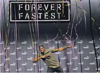  ?? FRANK AUGSTEIN/THE ASSOCIATED PRESS ?? Jamaican athlete Usain Bolt celebrates after a news conference Tuesday ahead of the World Athletics Championsh­ips in London. Sprint legend Bolt, a multiple Olympic and World Championsh­ip gold medallist, is set to retire after the World Championsh­ips,...